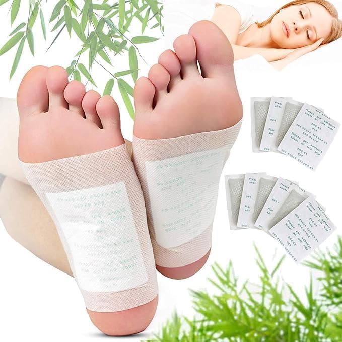 Hausify Kinoki Cleansing Detox Foot Patches shown on feet, designed for detoxification and cleansing purposes.