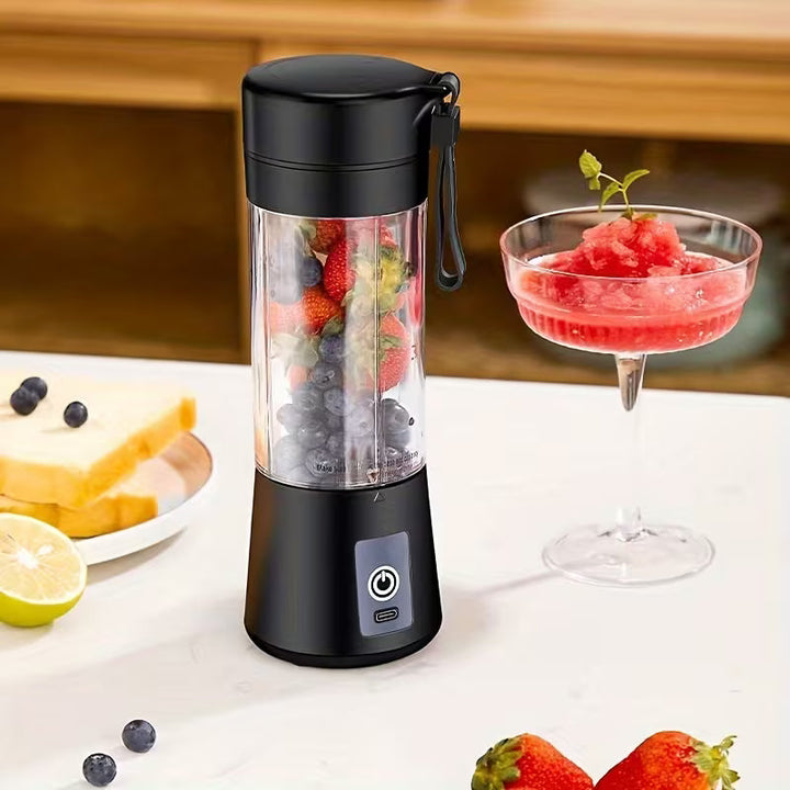 Hausfiy Mini Portable USB Electric Blender and Fruit Juicer showing a compact, rechargeable blender with a clear container filled with fruit.