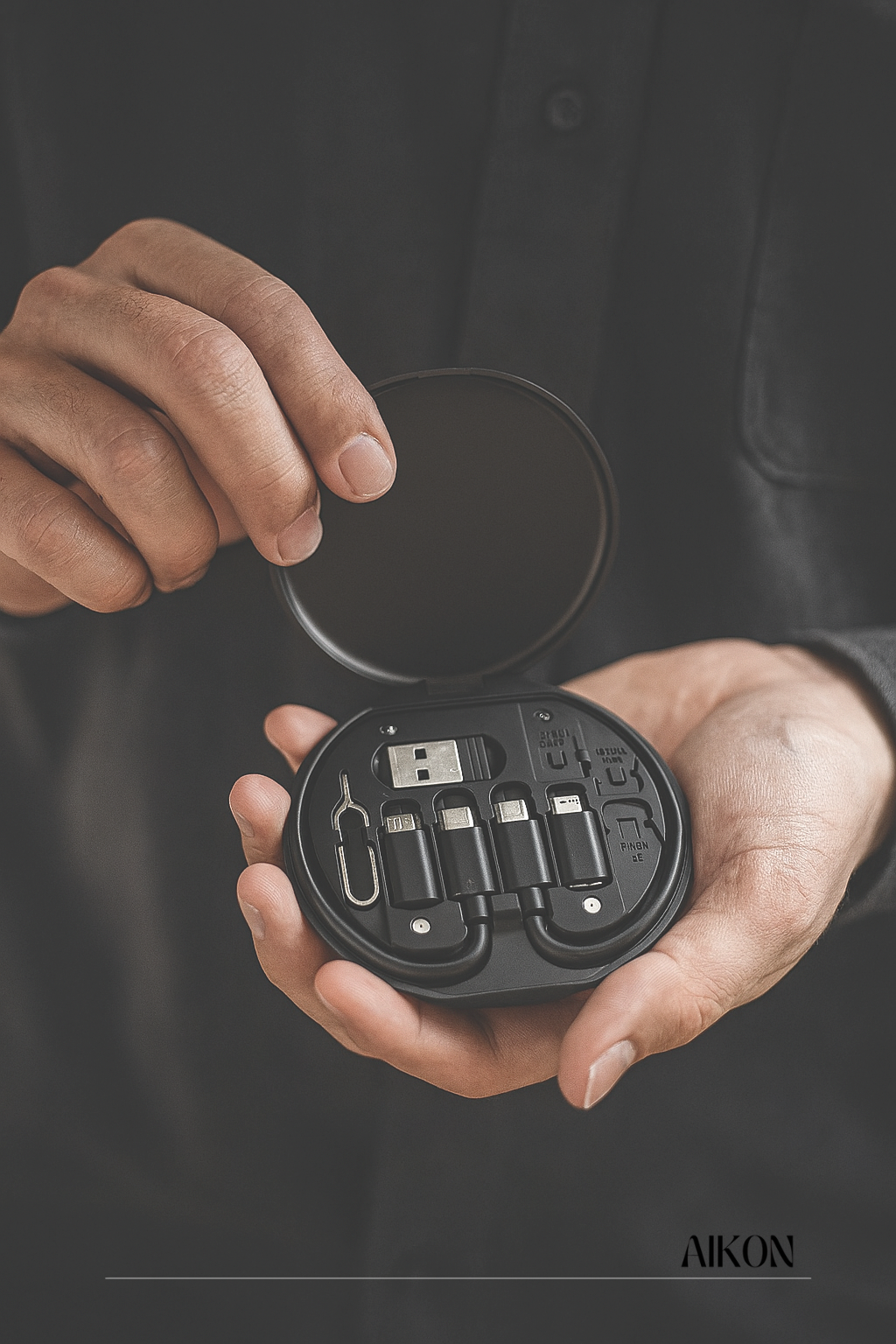Hausify TechMate 5-in-1 charger, SIM tool, and holder with sleek design, compact and multifunctional tech accessory.