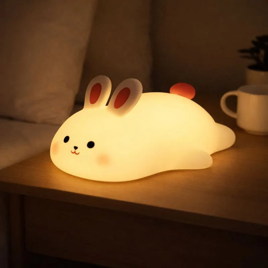Cute rabbit silicone lamp by Hausify Store with soft glow, featuring a adorable rabbit design perfect for children's room decor.
